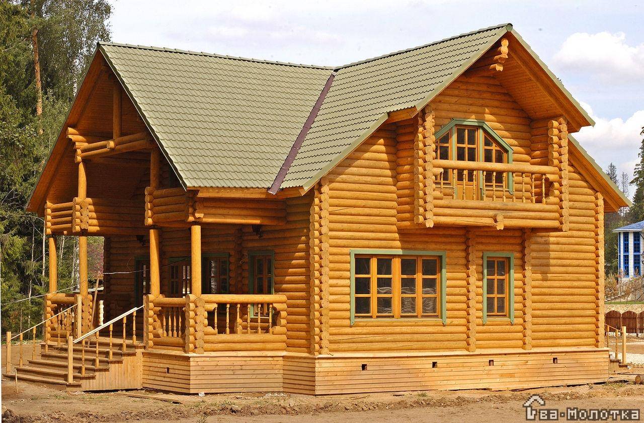 Оцилиндрованное бревно: плюсы и минусы, бревенчатые дома на фото
