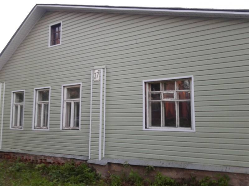 Внешняя отделка деревянного дома; фото облицовки, примеры монтажа сайдинга и термопанелей