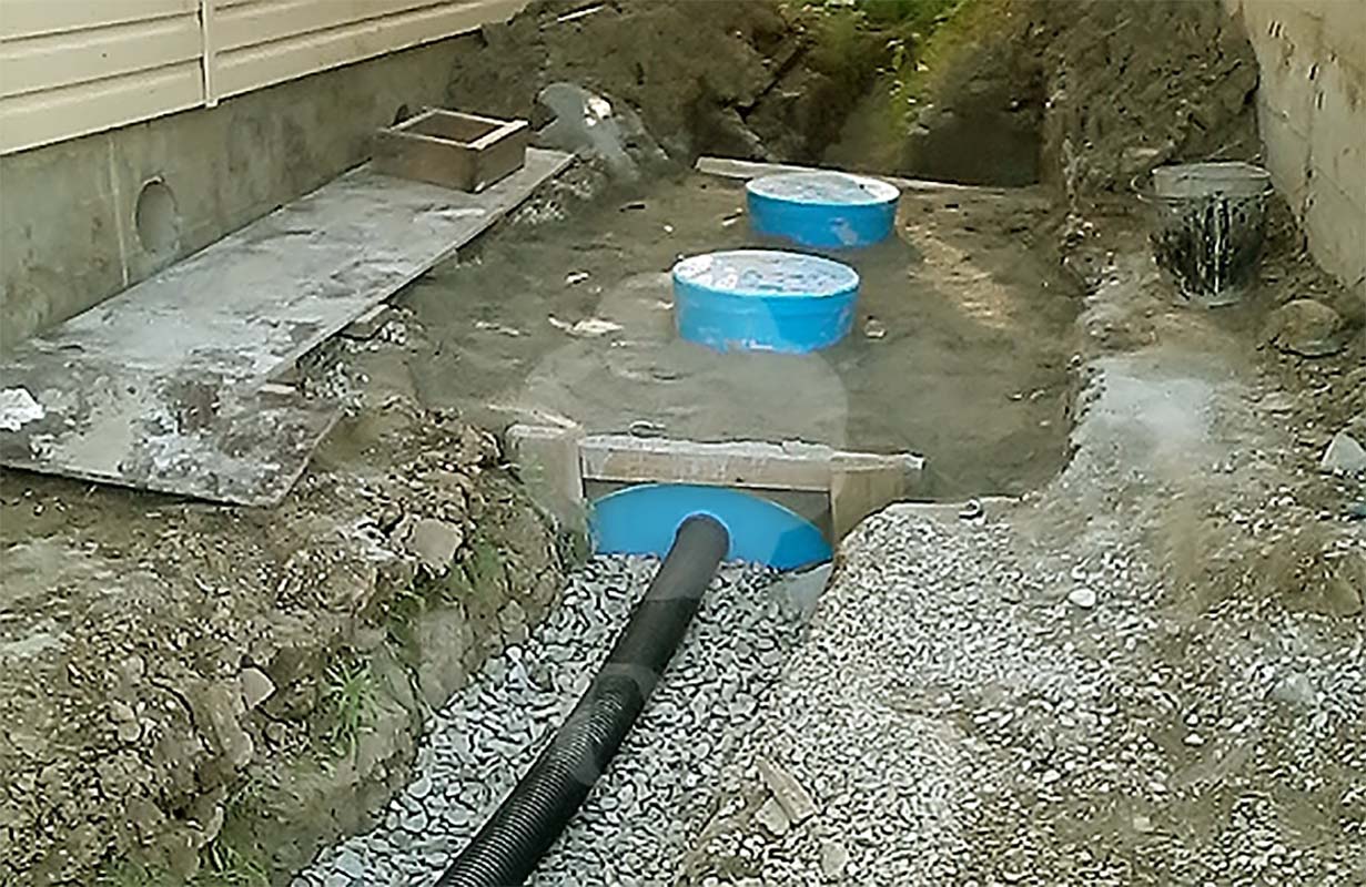 Монтаж септика на участке с высоким уровнем грунтовых вод.